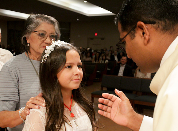 Holy Saturday At the Easter Vigil in the Holy Night of Easter at St. Patrick Community Church
