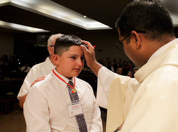Holy Saturday At the Easter Vigil in the Holy Night of Easter at St. Patrick Community Church