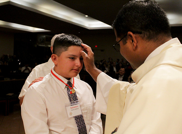 Holy Saturday At the Easter Vigil in the Holy Night of Easter at St. Patrick Community Church