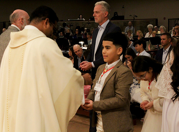 Holy Saturday At the Easter Vigil in the Holy Night of Easter at St. Patrick Community Church