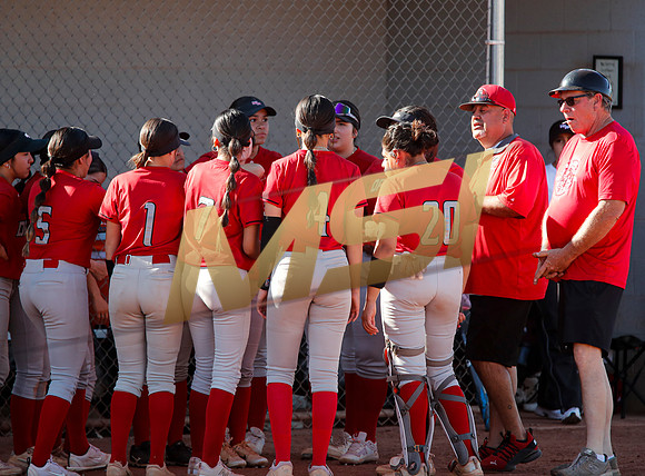 The  West Point Dragons girls softball team take on the Dobson Mustangs