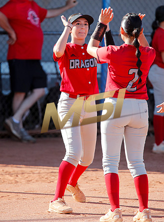 The  West Point Dragons girls softball team take on the Dobson Mustangs