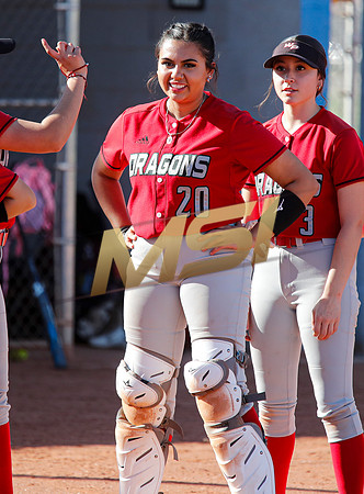 The  West Point Dragons girls softball team take on the Dobson Mustangs