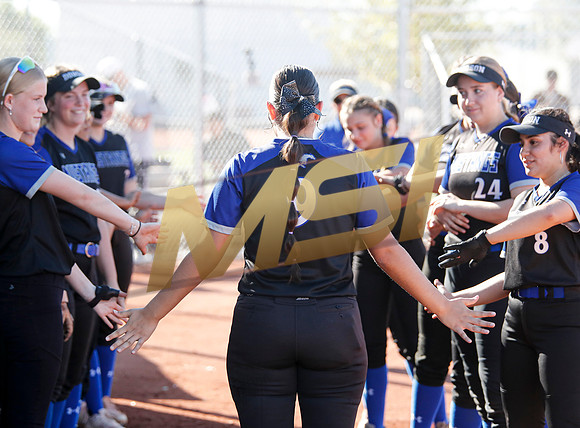 The  West Point Dragons girls softball team take on the Dobson Mustangs