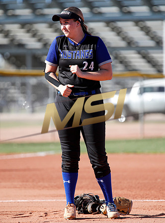 The  West Point Dragons girls softball team take on the Dobson Mustangs
