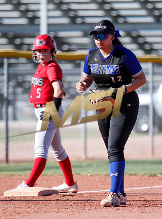 The  West Point Dragons girls softball team take on the Dobson Mustangs