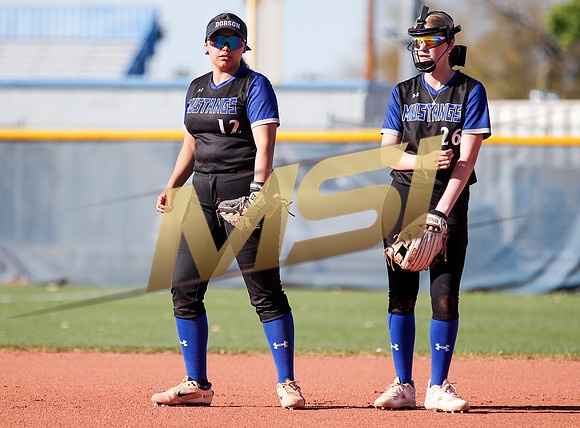 The  West Point Dragons girls softball team take on the Dobson Mustangs