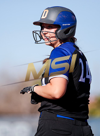 The  West Point Dragons girls softball team take on the Dobson Mustangs