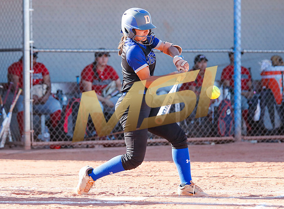 The  West Point Dragons girls softball team take on the Dobson Mustangs