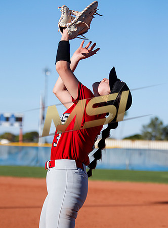 The  West Point Dragons girls softball team take on the Dobson Mustangs