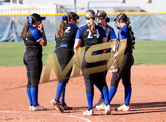 The  West Point Dragons girls softball team take on the Dobson Mustangs