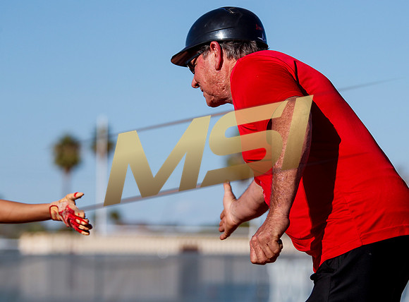 The  West Point Dragons girls softball team take on the Dobson Mustangs