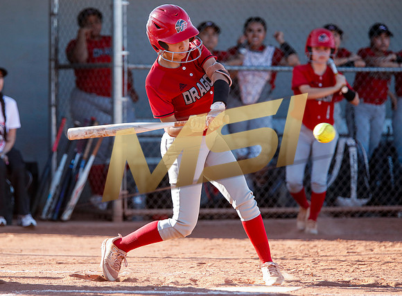The  West Point Dragons girls softball team take on the Dobson Mustangs