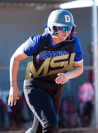 The  West Point Dragons girls softball team take on the Dobson Mustangs