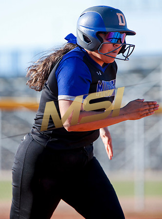 The  West Point Dragons girls softball team take on the Dobson Mustangs