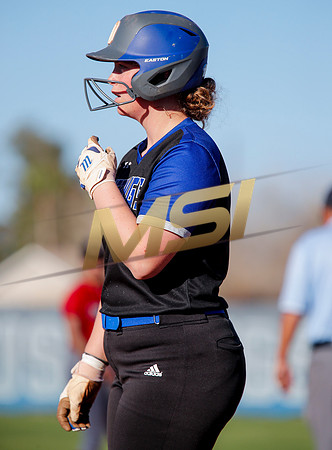 The  West Point Dragons girls softball team take on the Dobson Mustangs