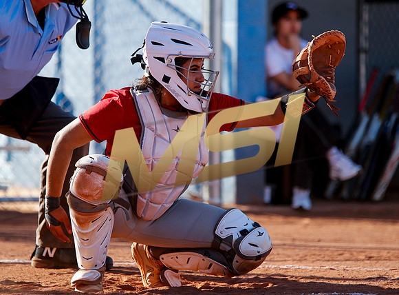 The  West Point Dragons girls softball team take on the Dobson Mustangs