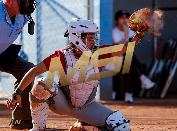 The  West Point Dragons girls softball team take on the Dobson Mustangs