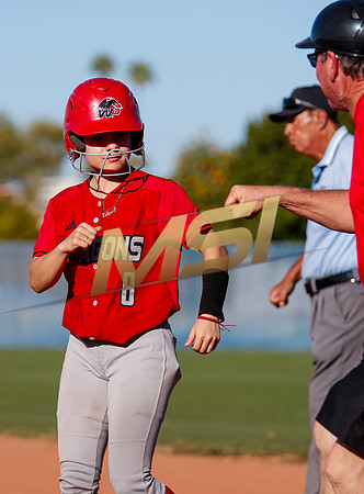 The  West Point Dragons girls softball team take on the Dobson Mustangs