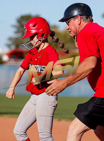 The  West Point Dragons girls softball team take on the Dobson Mustangs