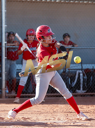 The  West Point Dragons girls softball team take on the Dobson Mustangs