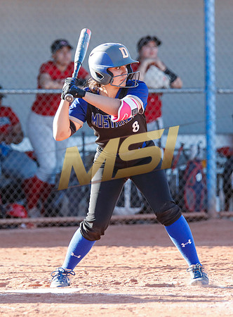 The  West Point Dragons girls softball team take on the Dobson Mustangs
