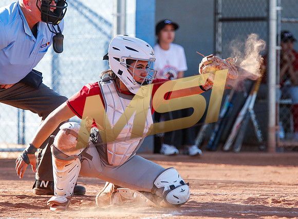 The  West Point Dragons girls softball team take on the Dobson Mustangs