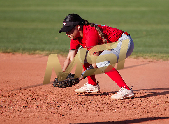 The  West Point Dragons girls softball team take on the Dobson Mustangs