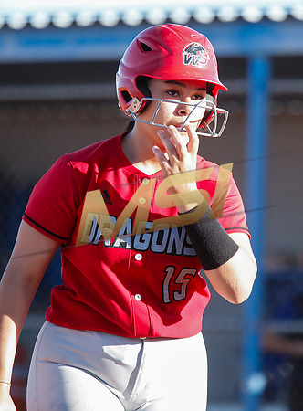 The  West Point Dragons girls softball team take on the Dobson Mustangs