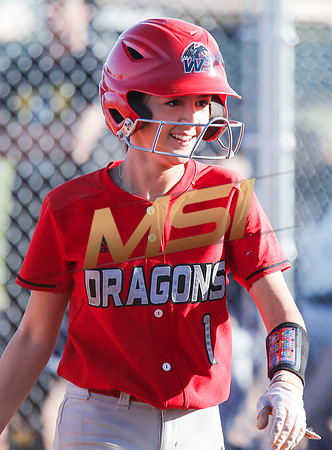 The  West Point Dragons girls softball team take on the Dobson Mustangs