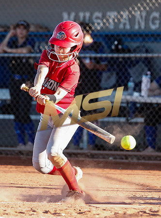 The  West Point Dragons girls softball team take on the Dobson Mustangs