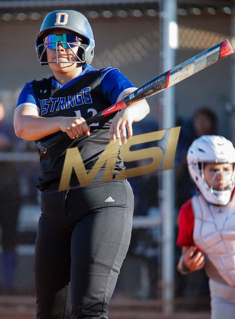 The  West Point Dragons girls softball team take on the Dobson Mustangs
