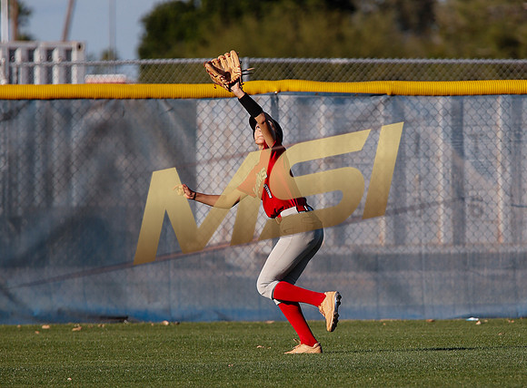 The  West Point Dragons girls softball team take on the Dobson Mustangs