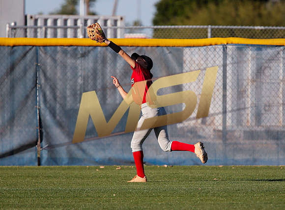 The  West Point Dragons girls softball team take on the Dobson Mustangs