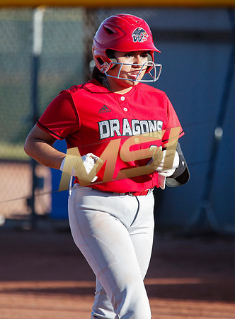 The  West Point Dragons girls softball team take on the Dobson Mustangs