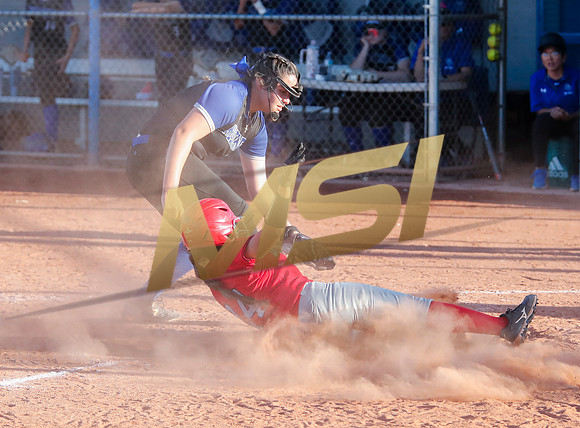 The  West Point Dragons girls softball team take on the Dobson Mustangs