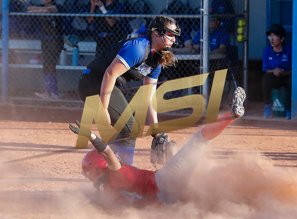 The  West Point Dragons girls softball team take on the Dobson Mustangs