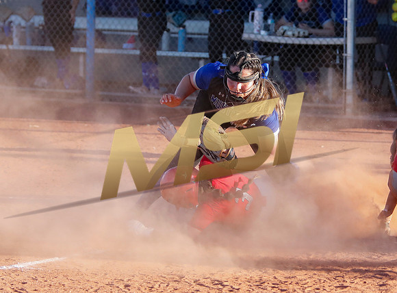The  West Point Dragons girls softball team take on the Dobson Mustangs