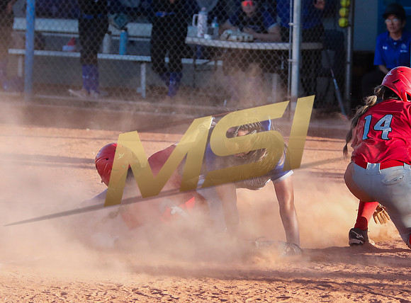 The  West Point Dragons girls softball team take on the Dobson Mustangs