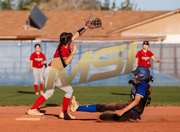 The  West Point Dragons girls softball team take on the Dobson Mustangs