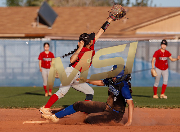 The  West Point Dragons girls softball team take on the Dobson Mustangs