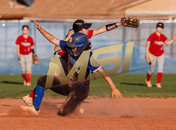 The  West Point Dragons girls softball team take on the Dobson Mustangs