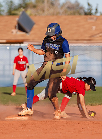 The  West Point Dragons girls softball team take on the Dobson Mustangs