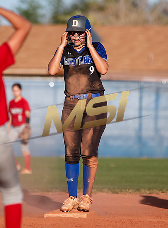 The  West Point Dragons girls softball team take on the Dobson Mustangs