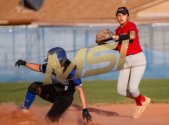 The  West Point Dragons girls softball team take on the Dobson Mustangs