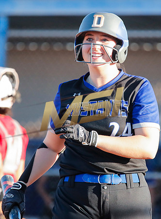 The  West Point Dragons girls softball team take on the Dobson Mustangs