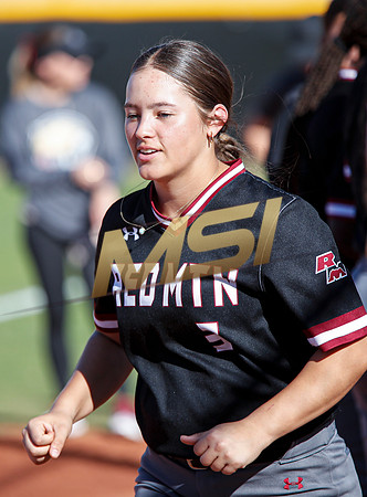 The  Red Mountain girls softball team take on the Basha Bears