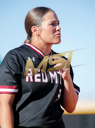 The  Red Mountain girls softball team take on the Basha Bears