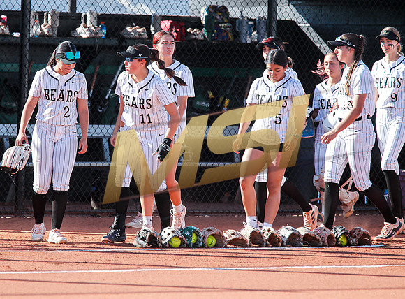 The  Red Mountain girls softball team take on the Basha Bears