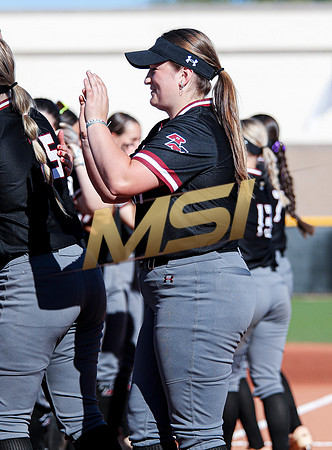 The  Red Mountain girls softball team take on the Basha Bears